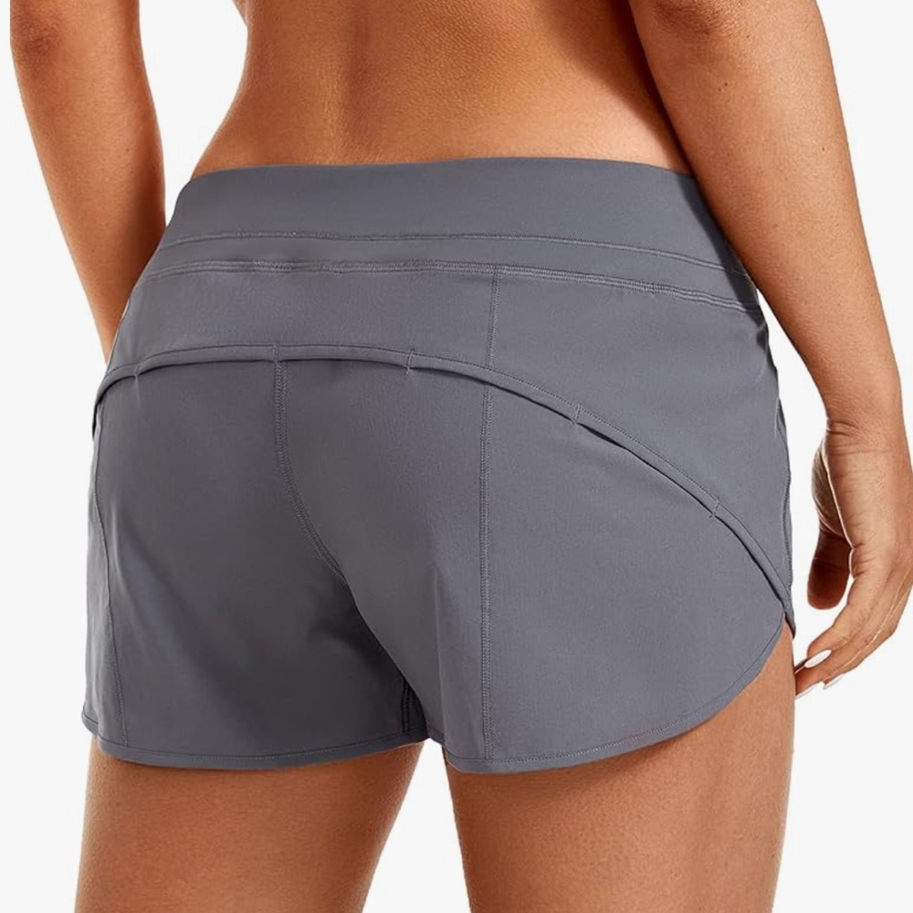 Women gray athletic shorts with zip pocket and mesh liner size M and NWOT